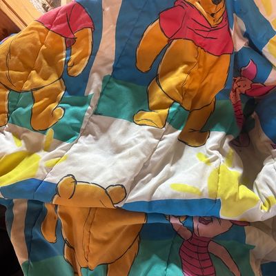 Sale Photo Thumbnail #98: Vintage Disney Winnie the Pooh and Piglet quilted comforter featuring a colorful graphic pattern.