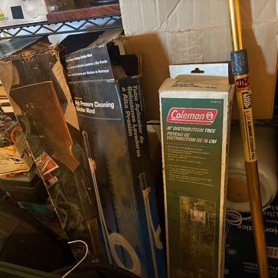 Sale Photo Thumbnail #133: Collection of boxed lawn and garden accessories, including a Coleman 30-inch distribution tree, a high-pressure cleaning wand, and a Tool Shop extension pole.
