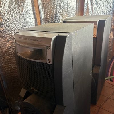 Sale Photo Thumbnail #95: Pair of black vintage Sony stereo speakers featuring hi-clarity horn tweeters, showing light dust and wear.
