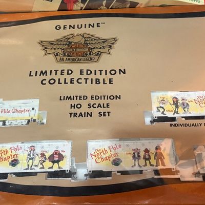 Sale Photo Thumbnail #11: Harley-Davidson Genuine Motor Clothes 'The North Pole Chapter' HO scale train set, boxed and limited edition.
