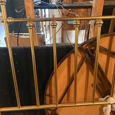 Sale Photo Thumbnail #105: Vintage polished brass headboard with arched top rail and decorative finial spindles.
