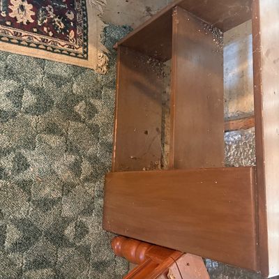 Sale Photo Thumbnail #99: Vintage brown wooden step-stool end table with built-in cubbies and turned spindle legs, showing light wear and cobwebs.