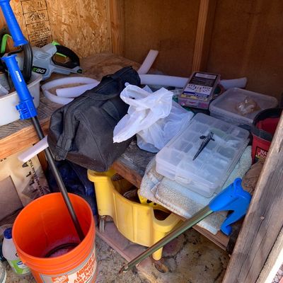 Sale Photo Thumbnail #24: Assortment of workshop and garden supplies including an orange Home Depot bucket, grabber tools, tool bags, and plastic organizer containers.