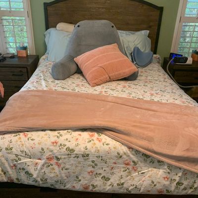 Sale Photo Thumbnail #106: Modern rustic wooden queen bed frame with arched headboard, flanked by matching nightstands.