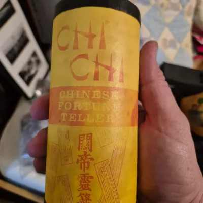 Sale Photo Thumbnail #59: Vintage Chi Chi Chinese Fortune Teller game container with bright yellow graphic label.