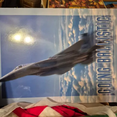 Sale Photo Thumbnail #48: Glossy military aviation poster featuring a fighter jet and the text "Going Ballistic."