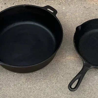 
10.5" Cast Iron Chicken Fryer USA And A Lodge Cast Iron 8" Skillet