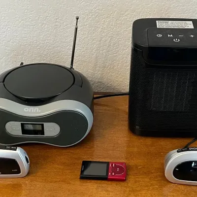 
Electronics - (2) Alarms, Sony Digital Media Player NWZ-E344, Onn CD Boombox, Soleil Ceramic Heater