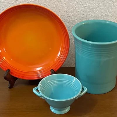 
Fiesta HLC USA Blue Canister, Le Creuset Ceramic Orange Bowl, Fiesta Style Creamer