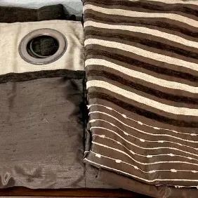 
Pair Of Studio JC Penny Brown And Tan Grommet Curtain Panels