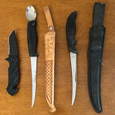 Black Stainless Serrated Pocket Knife With Cord Cutter And (2) Filet Knives With Sheaths