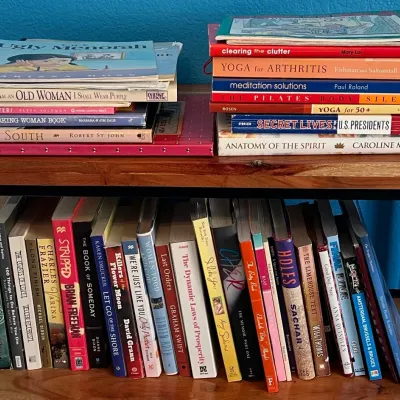 Assorted Paper And Hard Back Books - Yoga, Pilates, Children's, And More
