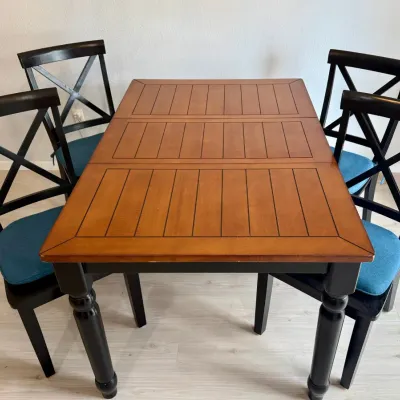 
2 Tone Black And Brown Farm Table With 4 Cross Back Chairs And Leaf