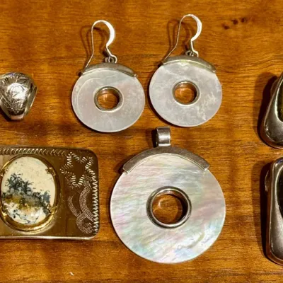 
Tiger's Eye And Mother Of Pearl Silver Tone Earring & Pendant Sets