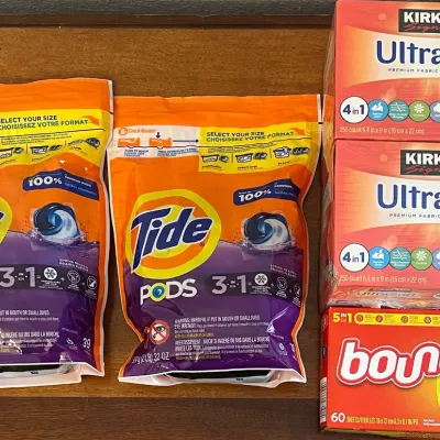 
(2) Unopened 2023 Tide Pod Packs, Kirkland 500 Count Dryer Sheets, And Bounce 60 Dryer Sheets