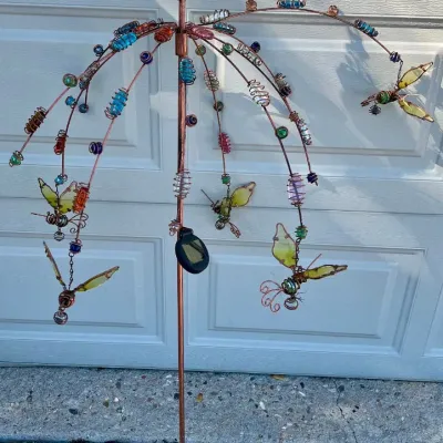 
54" Copper Tone Metal Solar Garden Sculpture