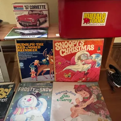 Sale Photo Thumbnail #41: Title: Vintage Christmas Vinyl Records and Buffalo Tools Parts Washer. Categories: Media / Records, Tools & Garage, Toys & Hobbies. Selection of vintage holiday LP records including Snoopy's Christmas, Rudolph, Frosty the Snowman, and Little Marcy, displa