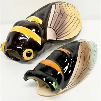 Sale Photo Thumbnail #69: Pair of vintage ceramic French Provencal cicada wall pocket vases with hand-painted details and glossy glaze.