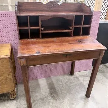 Sale Photo Thumbnail #19: Vintage dark stained wood secretary desk featuring a top organizer hutch with multiple cubbies and a single wide drawer.