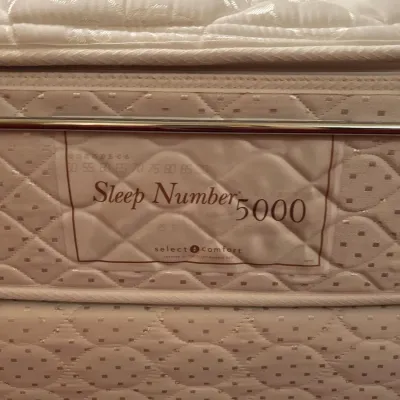 Sale Photo Thumbnail #28: Select Comfort Sleep Number 5000 mattress and box spring with quilted pillow-top cover.