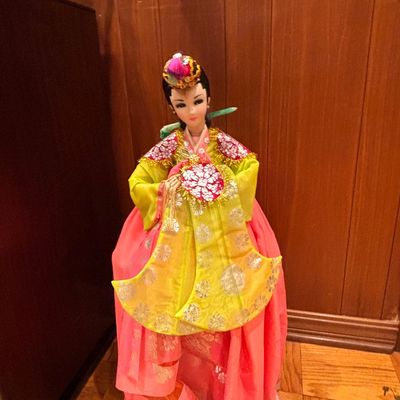 Sale Photo Thumbnail #113: Vintage Korean souvenir doll dressed in a colorful traditional silk hanbok with an ornate headpiece.