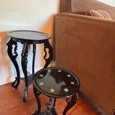 Sale Photo Thumbnail #154: Pair of Asian-style black lacquered plant stands with mother-of-pearl inlays and carved cabriole legs.