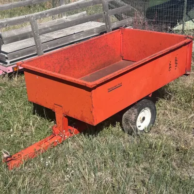 C montgomery ward orange tow behind steel yard cart