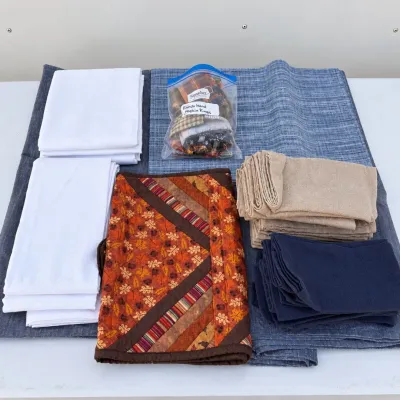 K assortment of table linens