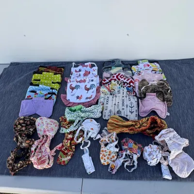B lot of 29 handmade hen and chicken saddles