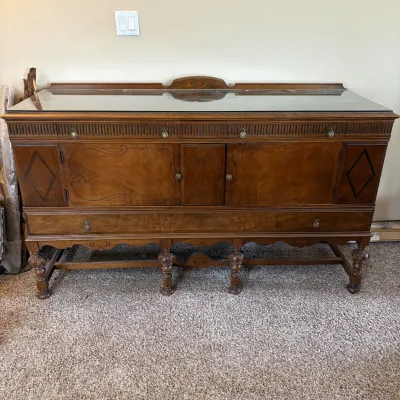 F jacobean style wood sideboard with glass top