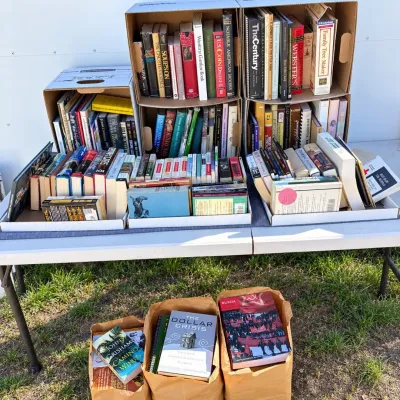 O huge assortment of hardcover and paperback books