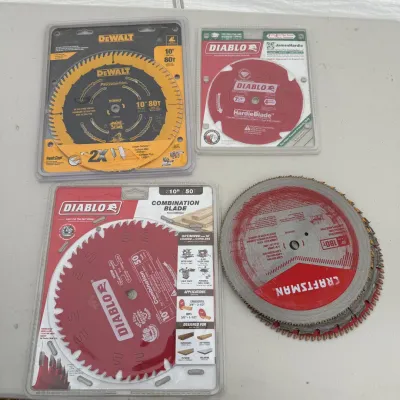 G set of various miter saw blades in multiple sizes