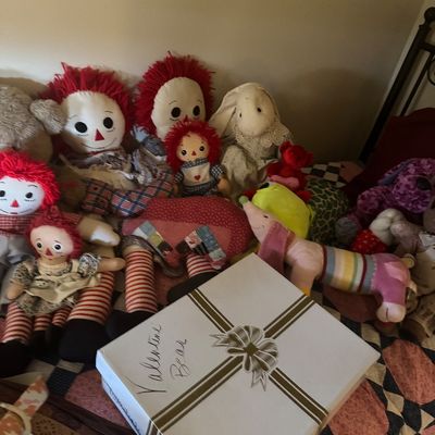 Sale Photo Thumbnail #63: Collection of vintage cloth dolls, including Raggedy Ann and Andy, stuffed animals, and a gift box labeled "Valentine Bear."