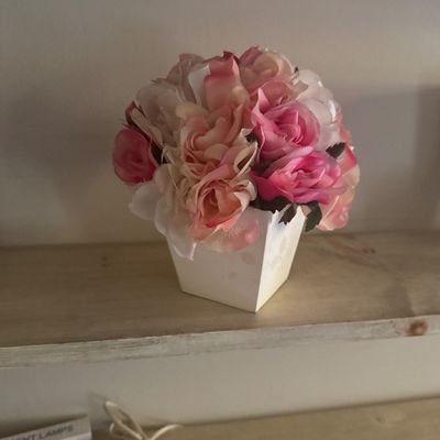 Sale Photo Thumbnail #68: Faux pink and white floral arrangement presented in a square white ceramic pot.