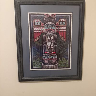 Sale Photo Thumbnail #74: Framed Pacific Northwest Indigenous-style totem pole art print, double-matted in a dark grey wood frame.