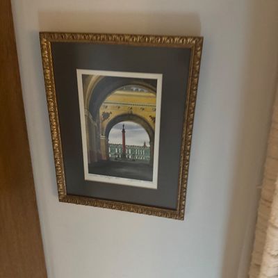 Sale Photo Thumbnail #182: Framed architectural print depicting an archway and monument, presented in a dark mat with an ornate gold-tone frame.