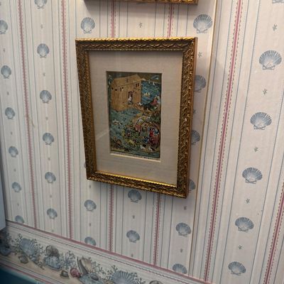Sale Photo Thumbnail #12: Framed illuminated manuscript print depicting Noah's Ark, set in an ornate gilded frame with beige matting.