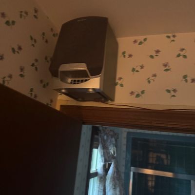 Sale Photo Thumbnail #15: Single Sony wall-mounted stereo speaker with silver trim and black mesh grille, installed near the ceiling.