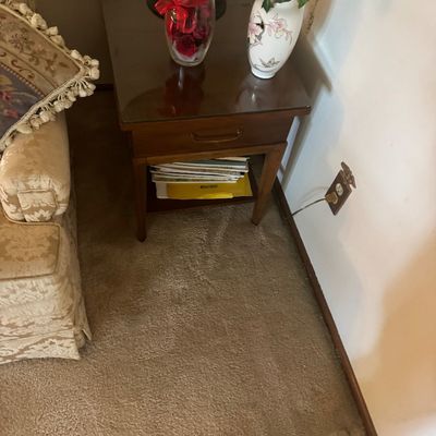Sale Photo Thumbnail #170: Mid-century modern style wooden end table with glass top insert, single drawer, and lower display shelf.