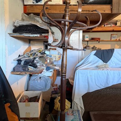 Sale Photo Thumbnail #173: Vintage Thonet-style bentwood coat rack with a turned central column and curved hooks.