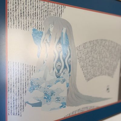 Framed Hisashi Otsuka art print featuring a Japanese Kabuki figure with blue matting and a thin gold-tone metal frame.