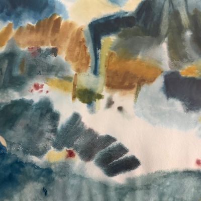 Framed abstract watercolor painting featuring fluid washes of blue, teal, ocher, and brown tones.