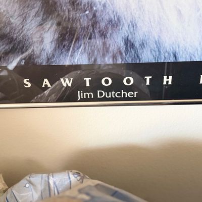 Sale Photo Thumbnail #136: Framed poster titled "The Sawtooth Pack" by Jim Dutcher, featuring wildlife photography.