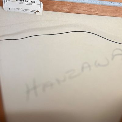 Back of a framed canvas painting signed Hanzawa with a Kembo Hanzawa studio sticker on the wooden frame.