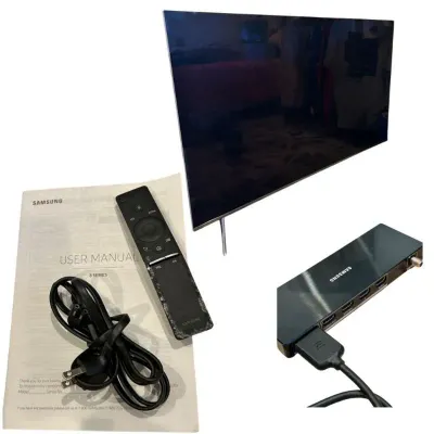 Sale Photo Thumbnail #204: Samsung 8 Series flat-screen television complete with remote control, power cable, One Connect box, and user manual.