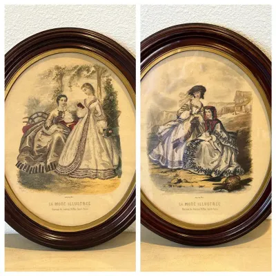 Sale Photo Thumbnail #196: Pair of antique La Mode Illustrée French fashion prints in matching oval dark wood frames with gold fillet inserts.