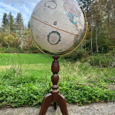 Sale Photo Thumbnail #157: Vintage Replogle 16-inch 'World Classic Series' floor globe mounted on a turned wooden tripod stand with brass semi-meridian.