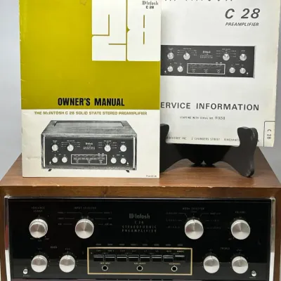 Sale Photo Thumbnail #54: Vintage McIntosh C28 solid-state stereophonic preamplifier housed in a walnut cabinet, complete with original owner's manual and service information booklet.