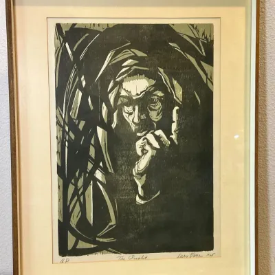 Sale Photo Thumbnail #50: Framed woodcut print titled "The Prophet" by Lucy Vane, artist's proof dated 1965, housed in a thin wooden frame with matting.