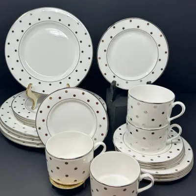 Sale Photo Thumbnail #91: Kate Spade New York 'Larabee Road' metallic polka dot porcelain dishware service, featuring silver-tone dots on white china.